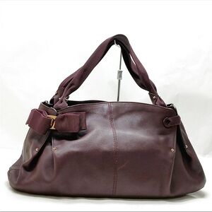 Salvatore Ferragamo Burgundy Vera bow hobo Bag.